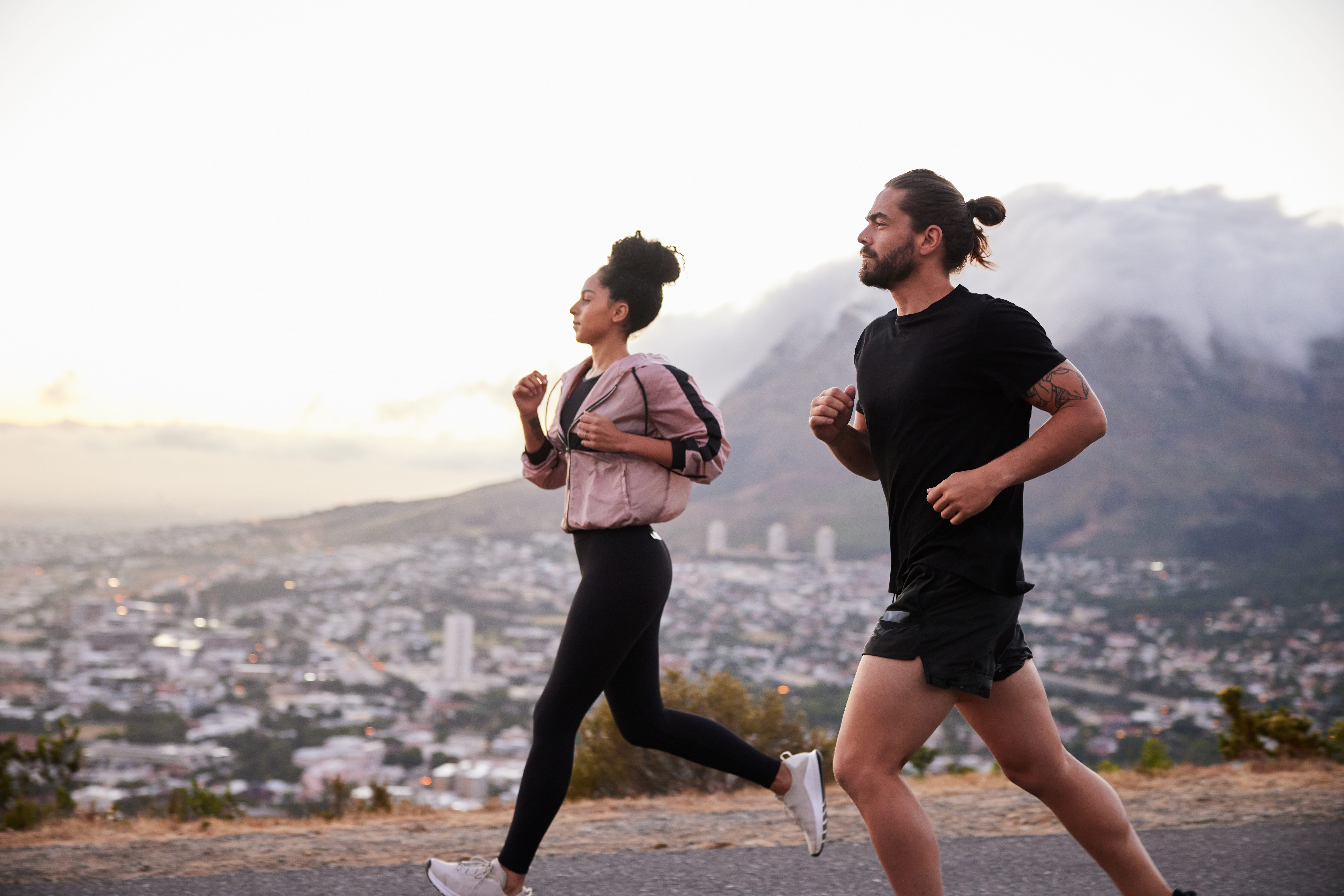 Couple jogging in mountains